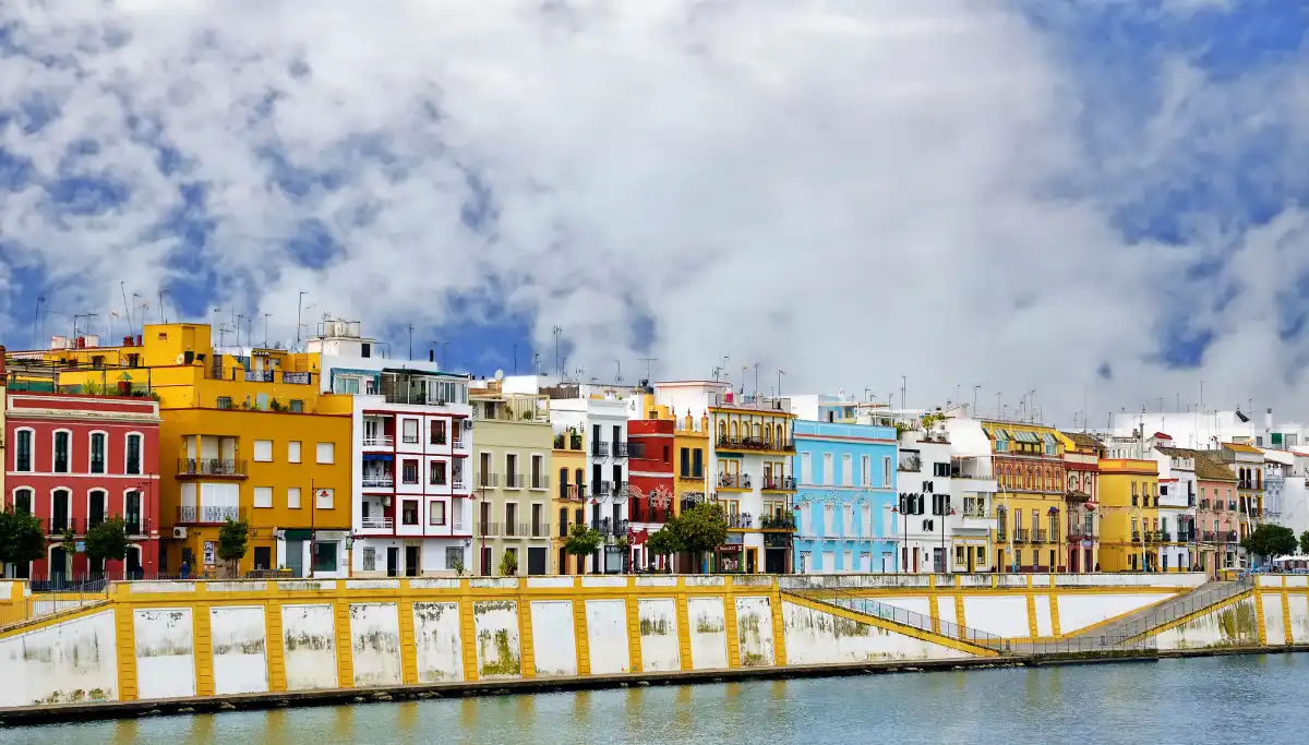 Colourful buildings lining Calle Betis along the Guadalquivir in Triana