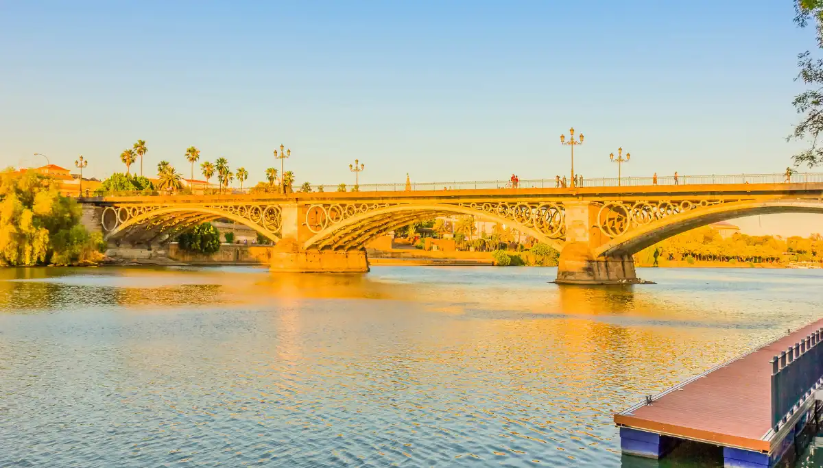 Seville Triana bridge at sunset