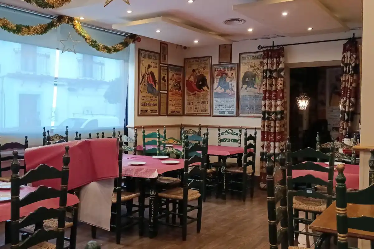 Sol y Sombra, a traditional bar in Triana with bullfighting decor.